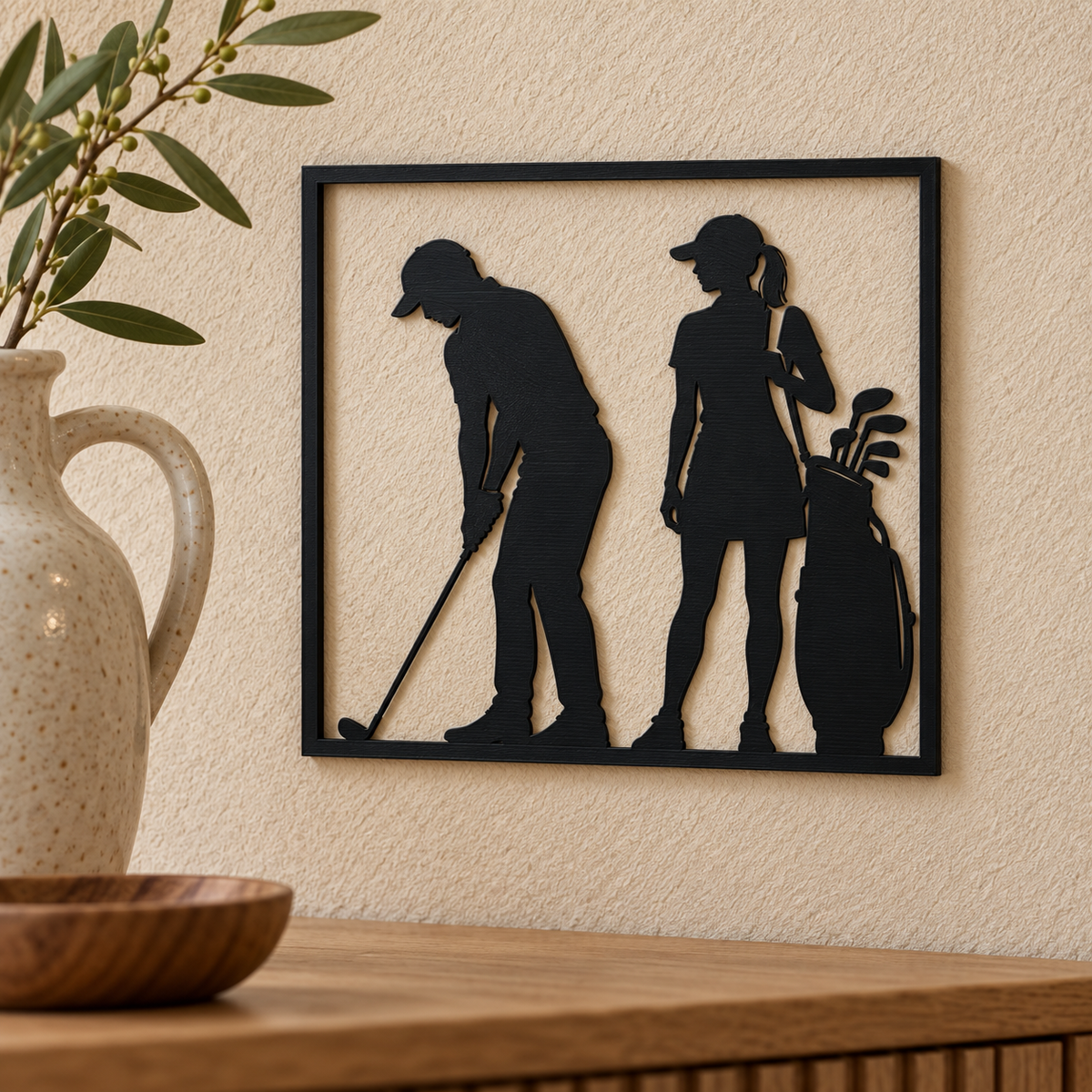 Quadretto da parete con golfista al colpo e golfista accanto alla sacca dei bastoni
