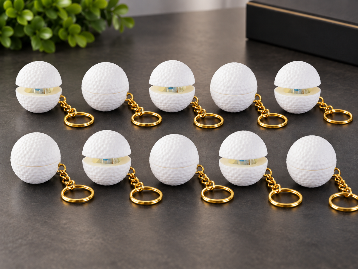 Pack da 10 fidget golf clicker con palline bianche e catenelle dorate